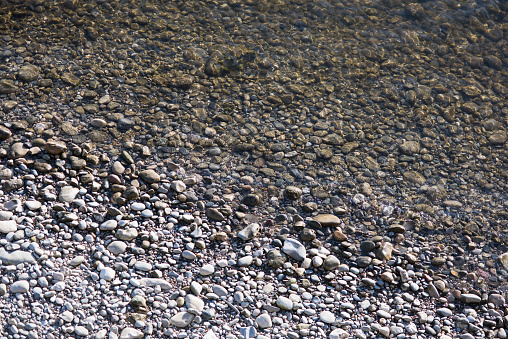 river bed with stones and half with water