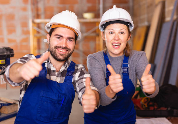 istock Two professional builders with thumbs up 1208971984