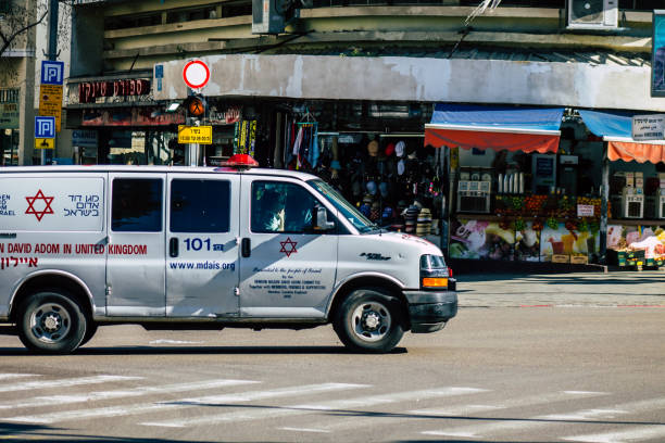 Colors of Israel Tel Aviv Israel February 25, 2020 View of a Israeli ambulance rolling in the streets of Tel Aviv in the evening ambulance in israel stock pictures, royalty-free photos & images