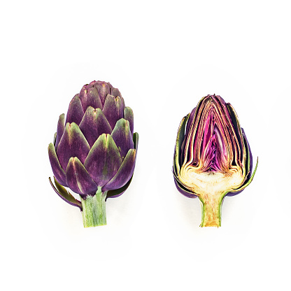 Two fresh raw artichokes isolated on white background. Top view.