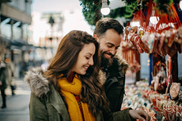 istock Young couple shopping for Christmas 1208982840