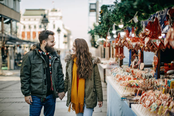 istock Young couple shopping for Christmas 1208982870