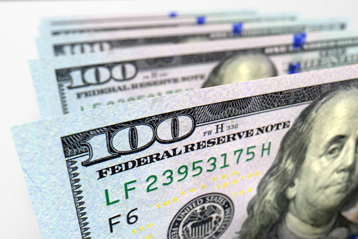 Money american dollars. One bill in focus. Business and finance concepts.