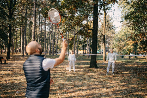 istock Family enjoys playing badminton 1208988201