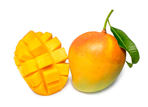 Mango fruit with leaves and mango cubes