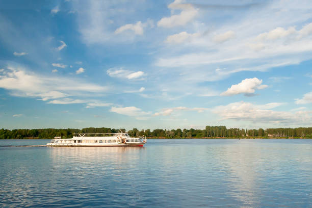 istock white tourist ship sailing on the river 1208992442