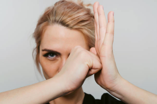 istock Combative mood! Young woman stretching her arms. Preparing to hard work 1208993547