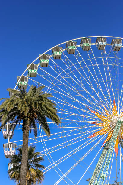 istock bright ferris wheel on a clear summers day with copy space 1208994753