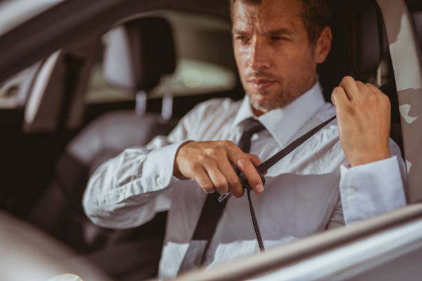 istock Businessman driving car 1209000707