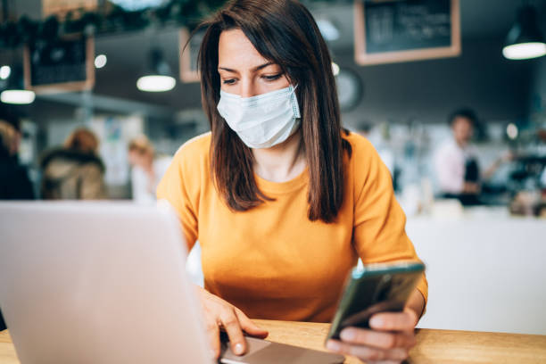 istock Woman with face protective mask 1209002956
