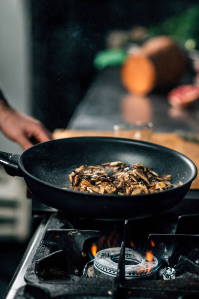 Frying sliced shiitake mushrooms