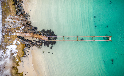 aerial view of a destroyed pier in troms couty, Norway