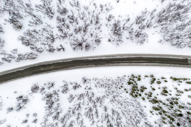road in winter from above in norway