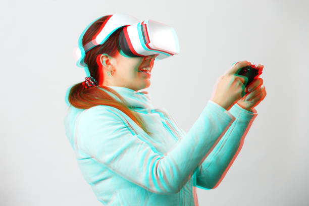 istock Woman with virtual reality headset is playing game. Image with glitch effect. 1209011414