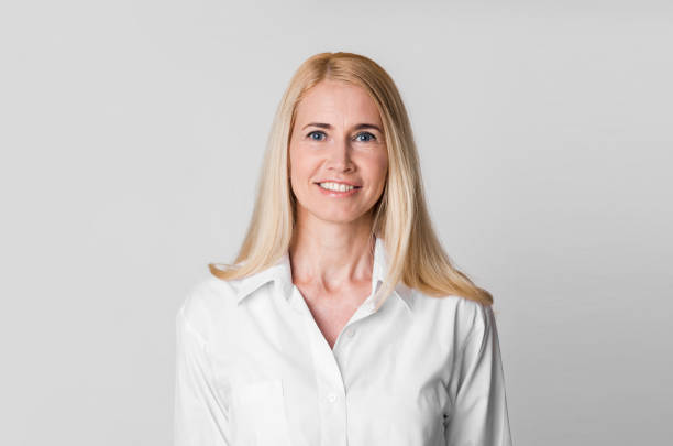 istock Natural beauty. Middle-aged woman smiling at camera 1209011421