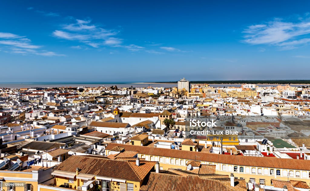 CItyscape of Sanlucar de Barrameda in southern Spain; high angle view. Cityscape of the coastal town of Sanlucar de Barrameda in southern Spain, as seen from the tower of Santiago castle; high angle view. Sanlúcar de Barrameda Stock Photo