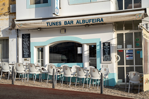 Albuferia, Portugal - January 23, 2020: Outside of the Tunes Bar Albuferia, a small pub with an outdoor patio