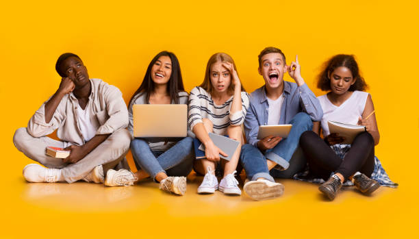 istock Group of exhausted students studying for school exams 1209015123