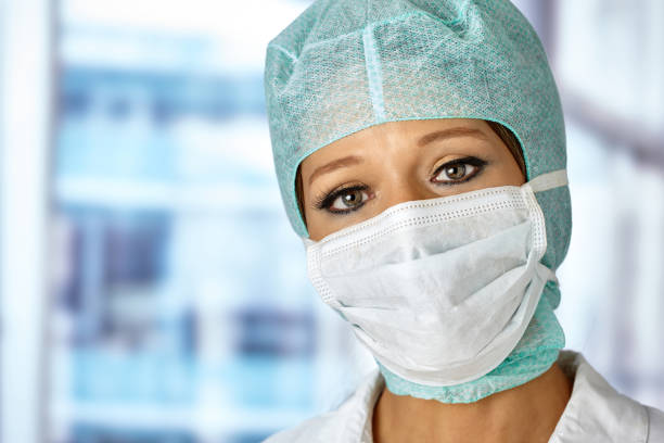 istock Woman with surgical cap and mouthguard 1209016227