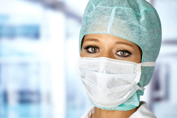istock Woman with surgical cap and mouthguard 1209016268