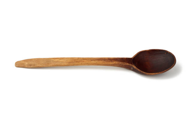 istock empty wooden old vintage spoon with long handle isolated on white background 1209016331