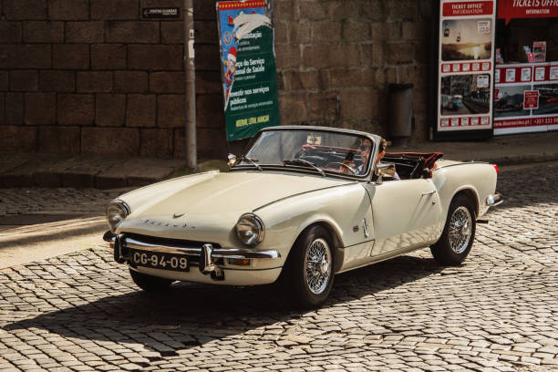 Vila-Nova de Gaia, Portugal - 6 February 2020: A vintage Triumph convertible sports car in a street of Vila-Nova de Gaia, near Porto, Portugal