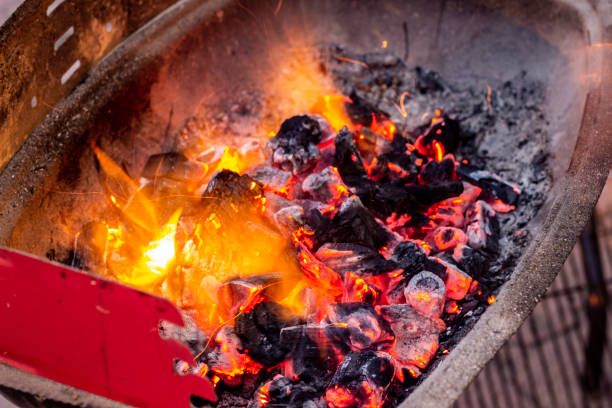 istock close up burning coals in a barbeque stand 1209020418