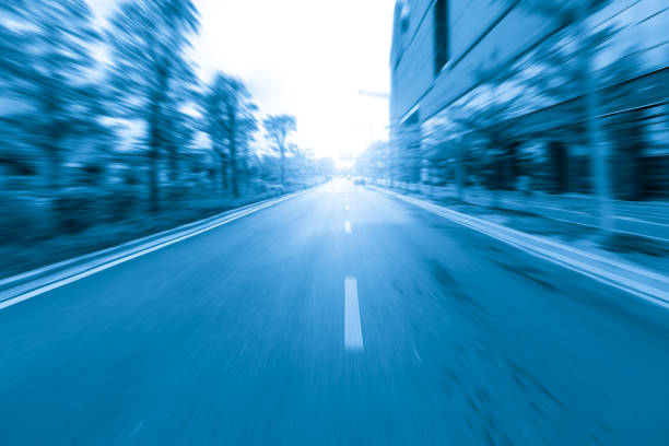 Blue style dynamic blurred highway and modern city buildings