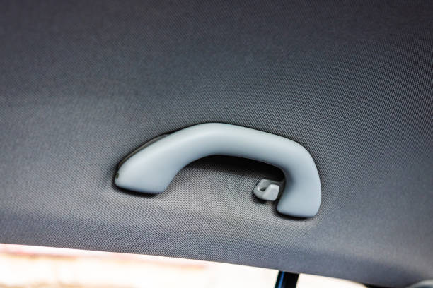 istock Close up photo inside a car, roof handle isolated. 1209026815