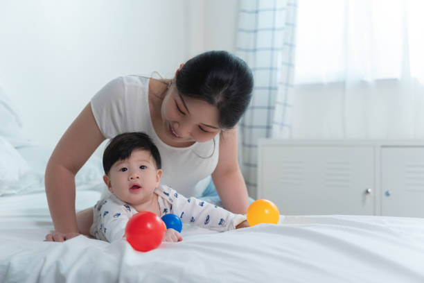 istock asian mother with asian baby 1209034243