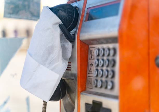 Public phone with tissue on handphone. The scene is situated in downtown district of Sofia, Bulgaria (Eastern Europe). The footage is taken with Sony A7III camera