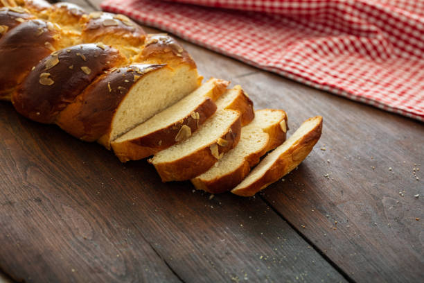 istock Easter greek tsoureki braid, sweet bread brioche on wood 1209035079
