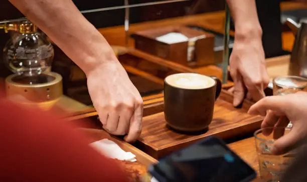 SHANGHAI, CHINA - JANUARY 11, 2020: The original stabucks coffee for their customer at the Starbucks Reserve Roastery in Shanghai. The second largest in the world.