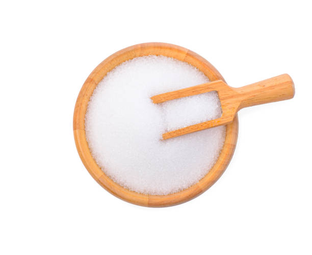 istock Bowl of sugar on white background 1209038639