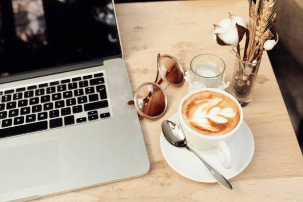 istock Coffee cup and laptop for business, Selective focus on coffee. 1209041065