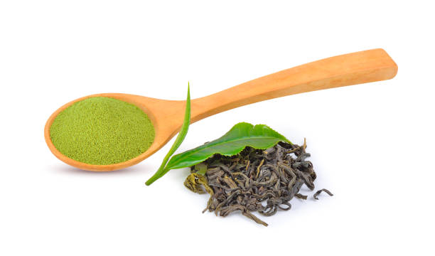 istock Green tea powder on white background 1209041300