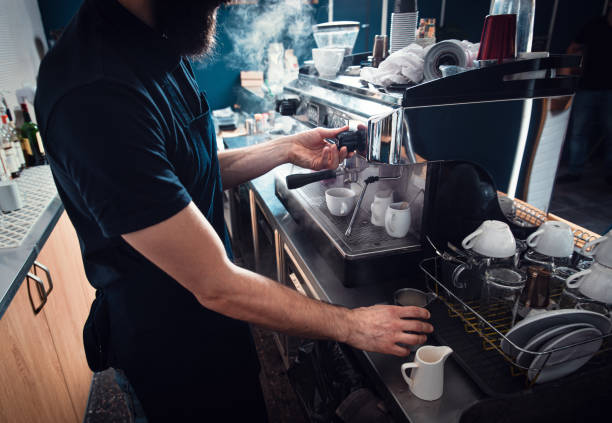 istock Barista preparing cappuccino on espresso machine. 1209043211