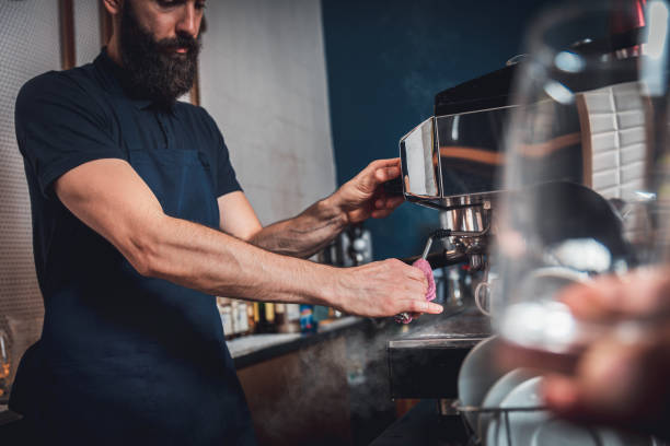 istock Barista preparing cappuccino on espresso machine. 1209043517