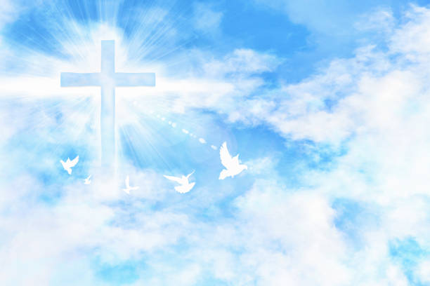 Cloudy blue sky with cross and doves flying Blue sky with clouds and cross with glare and doves flying. Horizontal composition cross shape cross religion christianity stock pictures, royalty-free photos & images
