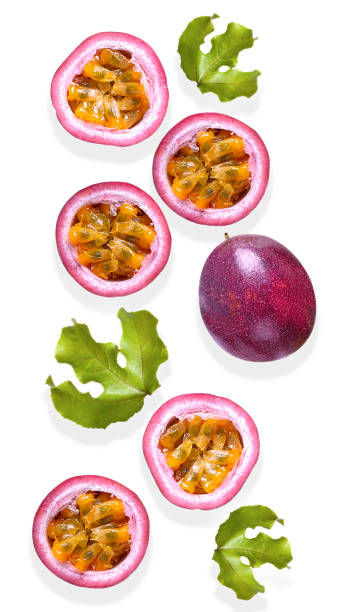 istock Whole passion fruits and a half  on white background .Top view 1209046090