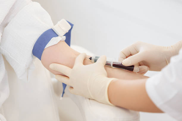 istock Doctor's hands take blood from a vein. Blood test concept 1209049328