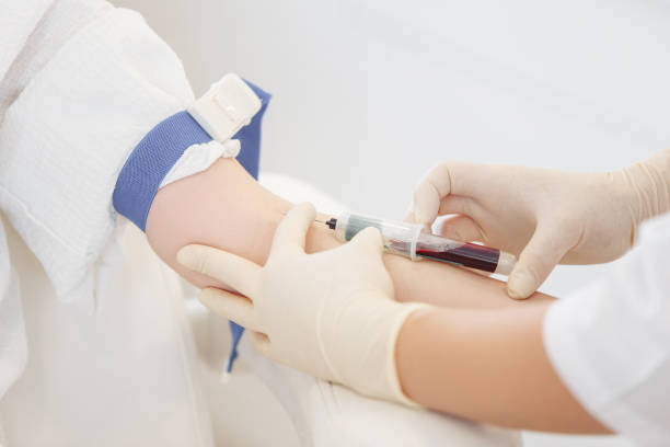 istock Doctor's hands take blood from a vein. Blood test concept 1209049598