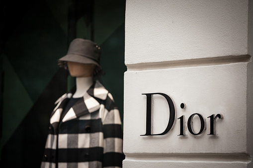 Picture of a Dior sign on their main boutique for Prague, Czech Republic. Christian Dior, commonly known as Dior, is a french luxury goods company retailing  ready-to-wear, leather goods, fashion accessories, footwear, jewelry, timepieces, fragrance, makeup, and skincare products