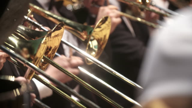 musician playing trumpet at concert