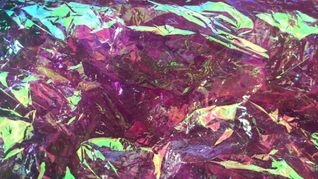 glittering holographic shiny wrapping foil background