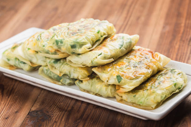 istock Fried Garlic Chive Dumplings, Steamed dumpling stuffed with garlic chives, garlic chives dim sum, 1209055182
