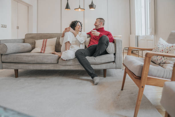 istock Couple sitting on the sofa 1209056930