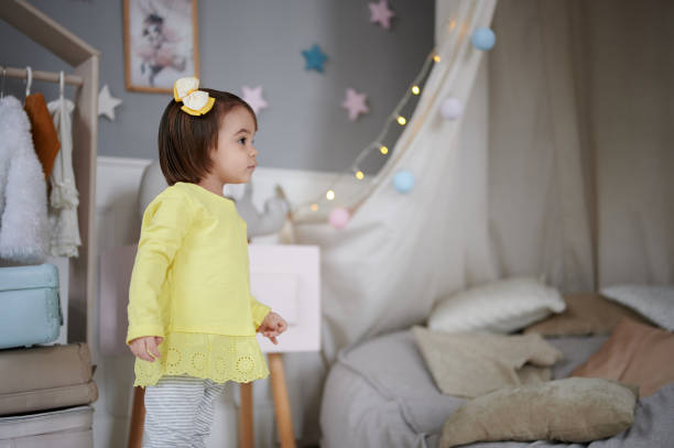 istock Cute baby girl in her room 1209057949