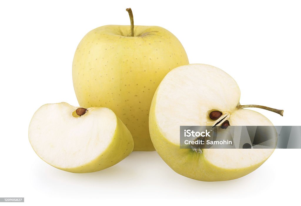 Yellow apples Ripe yellow apple with slices isolated on white Apple - Fruit Stock Photo
