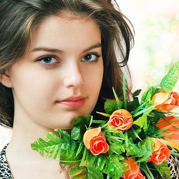 istock Young woman with flowers 120906186